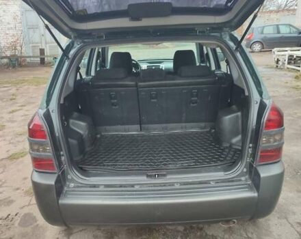 Зеленый Хендай Туксон, объемом двигателя 2 л и пробегом 213 тыс. км за 6500 $, фото 10 на Automoto.ua