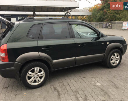 Зеленый Хендай Туксон, объемом двигателя 2 л и пробегом 223 тыс. км за 8500 $, фото 8 на Automoto.ua