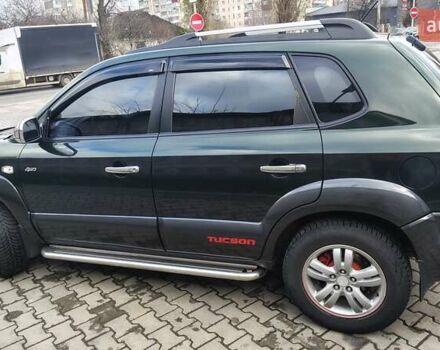 Зелений Хендай Туксон, об'ємом двигуна 1.98 л та пробігом 245 тис. км за 7800 $, фото 6 на Automoto.ua