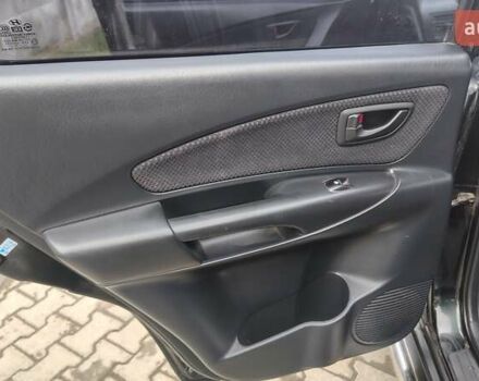 Зелений Хендай Туксон, об'ємом двигуна 1.98 л та пробігом 245 тис. км за 7800 $, фото 23 на Automoto.ua