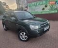 Зеленый Хендай Туксон, объемом двигателя 2 л и пробегом 225 тыс. км за 6100 $, фото 1 на Automoto.ua