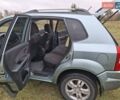 Зеленый Хендай Туксон, объемом двигателя 1.98 л и пробегом 129 тыс. км за 9200 $, фото 4 на Automoto.ua