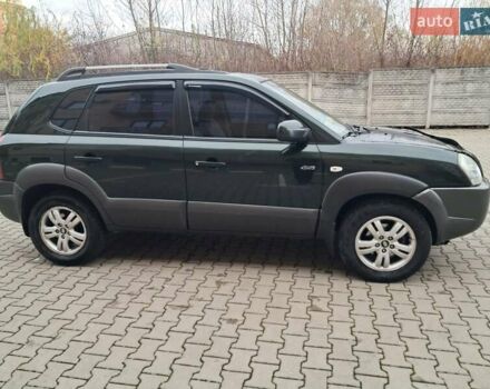 Зеленый Хендай Туксон, объемом двигателя 1.98 л и пробегом 280 тыс. км за 7200 $, фото 9 на Automoto.ua