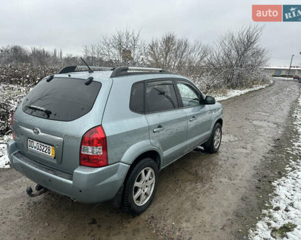 Зелений Хендай Туксон, об'ємом двигуна 2 л та пробігом 248 тис. км за 6999 $, фото 5 на Automoto.ua