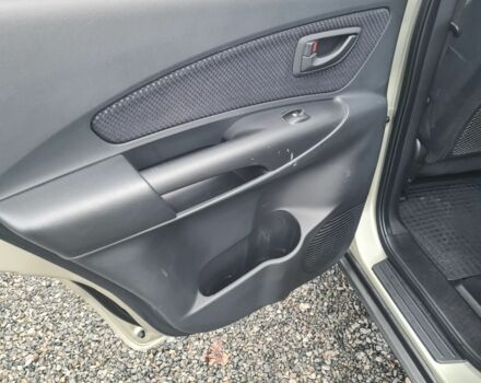 Зелений Хендай Туксон, об'ємом двигуна 2 л та пробігом 149 тис. км за 9900 $, фото 12 на Automoto.ua