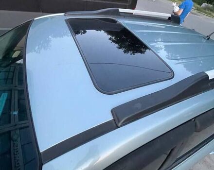 Зеленый Хендай Туксон, объемом двигателя 1.98 л и пробегом 205 тыс. км за 7700 $, фото 12 на Automoto.ua