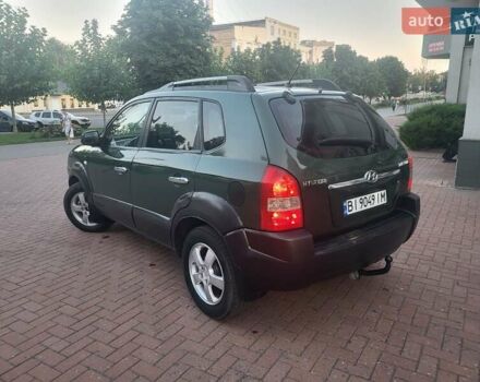 Зеленый Хендай Туксон, объемом двигателя 2 л и пробегом 225 тыс. км за 6100 $, фото 4 на Automoto.ua