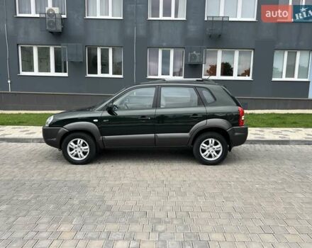 Зеленый Хендай Туксон, объемом двигателя 2 л и пробегом 82 тыс. км за 9950 $, фото 4 на Automoto.ua