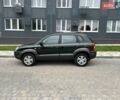 Зеленый Хендай Туксон, объемом двигателя 2 л и пробегом 82 тыс. км за 9950 $, фото 4 на Automoto.ua