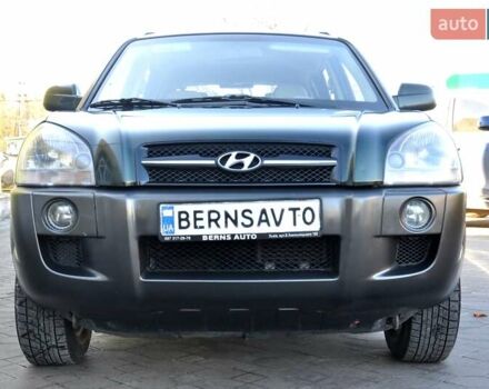 Зеленый Хендай Туксон, объемом двигателя 1.98 л и пробегом 245 тыс. км за 7200 $, фото 4 на Automoto.ua