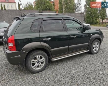 Зеленый Хендай Туксон, объемом двигателя 1.98 л и пробегом 363 тыс. км за 7400 $, фото 8 на Automoto.ua