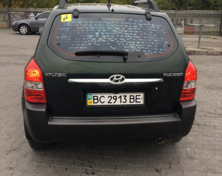 Зеленый Хендай Туксон, объемом двигателя 2 л и пробегом 223 тыс. км за 8500 $, фото 4 на Automoto.ua