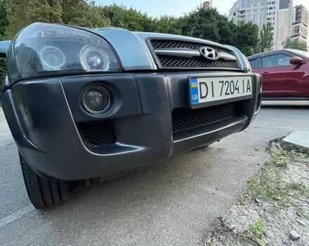 Зеленый Хендай Туксон, объемом двигателя 1.98 л и пробегом 205 тыс. км за 7700 $, фото 9 на Automoto.ua