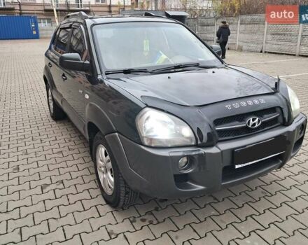 Зеленый Хендай Туксон, объемом двигателя 1.98 л и пробегом 280 тыс. км за 7200 $, фото 11 на Automoto.ua