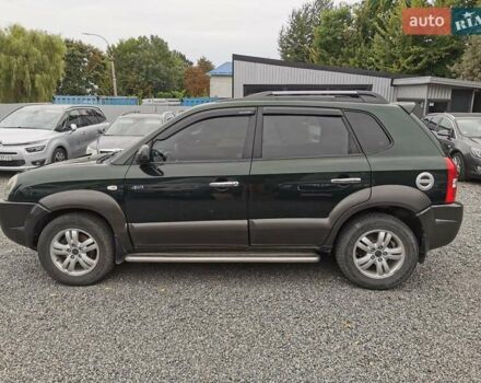 Зеленый Хендай Туксон, объемом двигателя 1.98 л и пробегом 363 тыс. км за 7400 $, фото 15 на Automoto.ua
