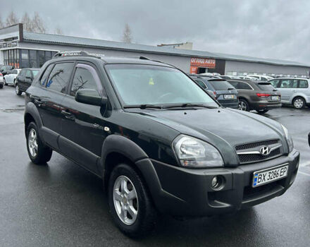 Зеленый Хендай Туксон, объемом двигателя 1.98 л и пробегом 237 тыс. км за 7500 $, фото 2 на Automoto.ua