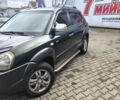 Зелений Хендай Туксон, об'ємом двигуна 1.98 л та пробігом 245 тис. км за 7800 $, фото 17 на Automoto.ua