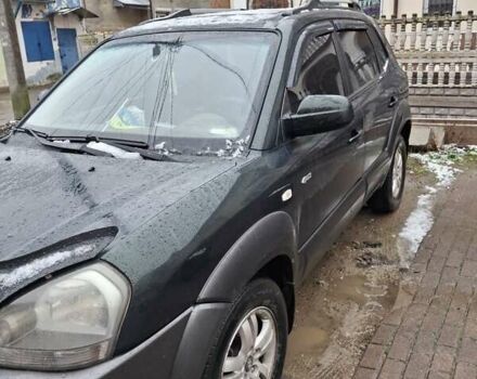 Зелений Хендай Туксон, об'ємом двигуна 1.98 л та пробігом 280 тис. км за 8500 $, фото 6 на Automoto.ua