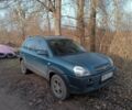 Зеленый Хендай Туксон, объемом двигателя 2 л и пробегом 250 тыс. км за 6000 $, фото 1 на Automoto.ua