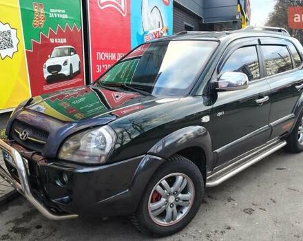Зелений Хендай Туксон, об'ємом двигуна 1.98 л та пробігом 245 тис. км за 7800 $, фото 2 на Automoto.ua