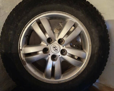 Зеленый Хендай Туксон, объемом двигателя 1.98 л и пробегом 195 тыс. км за 8000 $, фото 30 на Automoto.ua