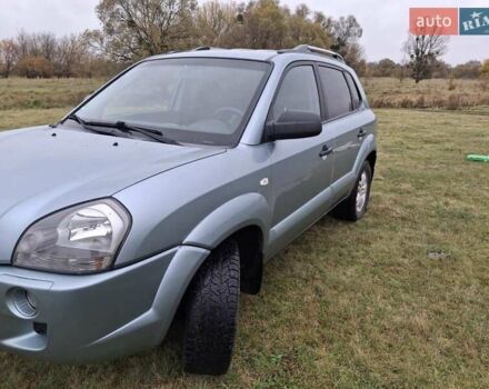 Зеленый Хендай Туксон, объемом двигателя 1.98 л и пробегом 129 тыс. км за 9200 $, фото 8 на Automoto.ua