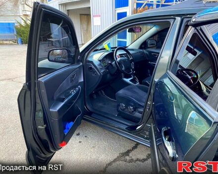 Зелений Хендай Туксон, об'ємом двигуна 2 л та пробігом 236 тис. км за 7600 $, фото 1 на Automoto.ua