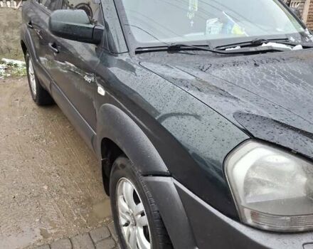 Зелений Хендай Туксон, об'ємом двигуна 1.98 л та пробігом 280 тис. км за 8500 $, фото 4 на Automoto.ua