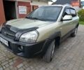 Зеленый Хендай Туксон, объемом двигателя 1.98 л и пробегом 179 тыс. км за 8000 $, фото 1 на Automoto.ua