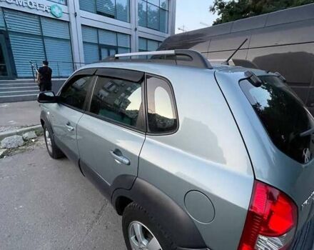 Зеленый Хендай Туксон, объемом двигателя 1.98 л и пробегом 205 тыс. км за 7700 $, фото 13 на Automoto.ua