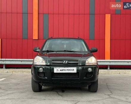 Зеленый Хендай Туксон, объемом двигателя 1.99 л и пробегом 214 тыс. км за 7290 $, фото 2 на Automoto.ua