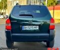 Зеленый Хендай Туксон, объемом двигателя 2 л и пробегом 172 тыс. км за 7000 $, фото 2 на Automoto.ua
