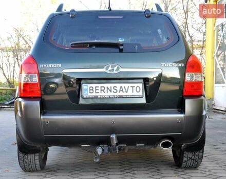Зеленый Хендай Туксон, объемом двигателя 1.98 л и пробегом 245 тыс. км за 7200 $, фото 10 на Automoto.ua