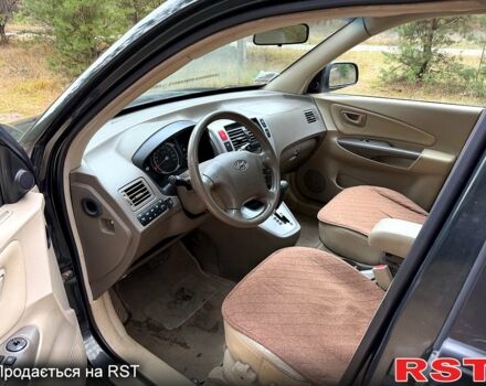 Зеленый Хендай Туксон, объемом двигателя 2 л и пробегом 185 тыс. км за 7950 $, фото 10 на Automoto.ua