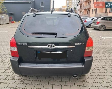 Зеленый Хендай Туксон, объемом двигателя 1.98 л и пробегом 280 тыс. км за 7200 $, фото 5 на Automoto.ua