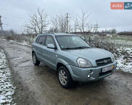 Зелений Хендай Туксон, об'ємом двигуна 2 л та пробігом 248 тис. км за 6999 $, фото 2 на Automoto.ua