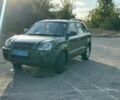 Зеленый Хендай Туксон, объемом двигателя 2 л и пробегом 130 тыс. км за 2500 $, фото 1 на Automoto.ua