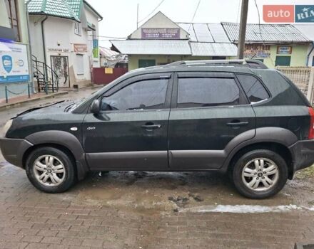 Зелений Хендай Туксон, об'ємом двигуна 1.98 л та пробігом 280 тис. км за 8500 $, фото 7 на Automoto.ua