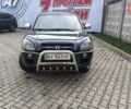 Зелений Хендай Туксон, об'ємом двигуна 1.98 л та пробігом 245 тис. км за 7800 $, фото 16 на Automoto.ua