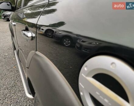 Зеленый Хендай Туксон, объемом двигателя 1.98 л и пробегом 363 тыс. км за 7400 $, фото 18 на Automoto.ua