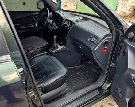 Зелений Хендай Туксон, об'ємом двигуна 2 л та пробігом 276 тис. км за 9000 $, фото 3 на Automoto.ua