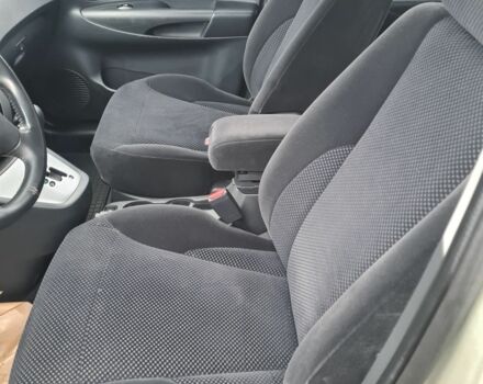 Зелений Хендай Туксон, об'ємом двигуна 2 л та пробігом 149 тис. км за 9900 $, фото 9 на Automoto.ua