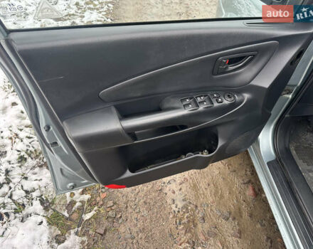 Зелений Хендай Туксон, об'ємом двигуна 2 л та пробігом 248 тис. км за 6999 $, фото 13 на Automoto.ua