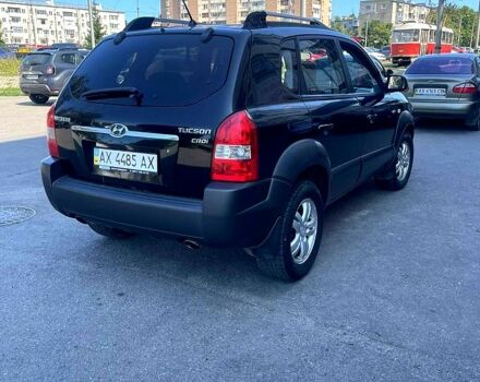 Зеленый Хендай Туксон, объемом двигателя 2 л и пробегом 317 тыс. км за 5700 $, фото 3 на Automoto.ua