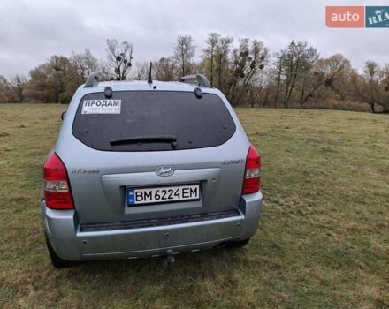 Зеленый Хендай Туксон, объемом двигателя 1.98 л и пробегом 129 тыс. км за 9200 $, фото 10 на Automoto.ua