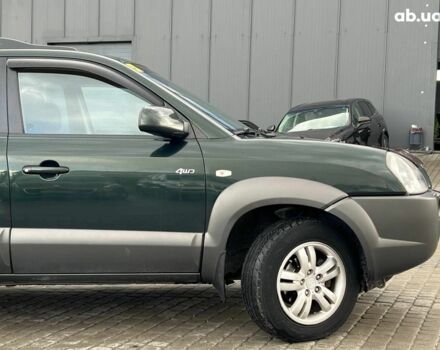 Зеленый Хендай Туксон, объемом двигателя 2 л и пробегом 223 тыс. км за 8540 $, фото 3 на Automoto.ua