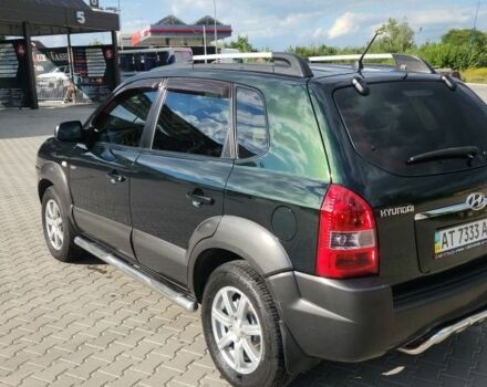 Зелений Хендай Туксон, об'ємом двигуна 2 л та пробігом 208 тис. км за 8500 $, фото 4 на Automoto.ua