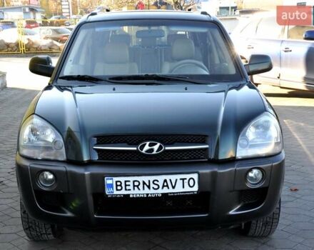 Зеленый Хендай Туксон, объемом двигателя 1.98 л и пробегом 245 тыс. км за 7200 $, фото 3 на Automoto.ua