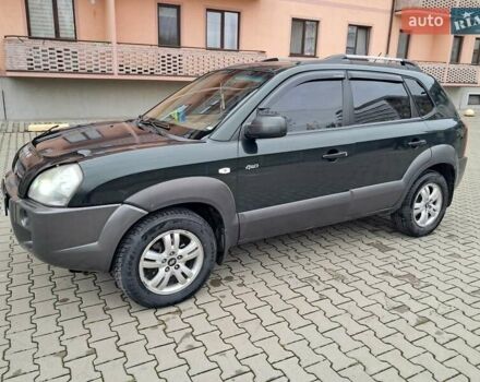 Зеленый Хендай Туксон, объемом двигателя 1.98 л и пробегом 280 тыс. км за 7200 $, фото 1 на Automoto.ua