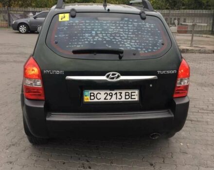 Зеленый Хендай Туксон, объемом двигателя 2 л и пробегом 223 тыс. км за 8500 $, фото 2 на Automoto.ua